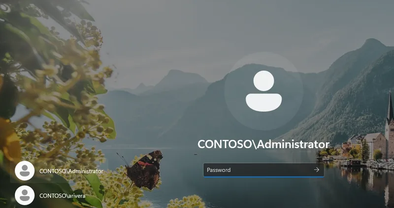 Windows 11 sign-in screen after domain join, showing CONTOSO domain user accounts available to sign in with, confirming the client successfully joined the contoso.local domain