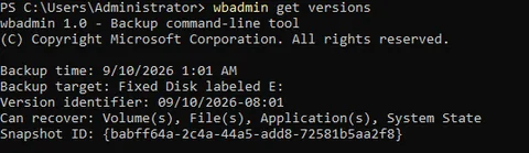 wbadmin get versions output listing a completed System State backup on the domain controller with its version identifier and timestamp